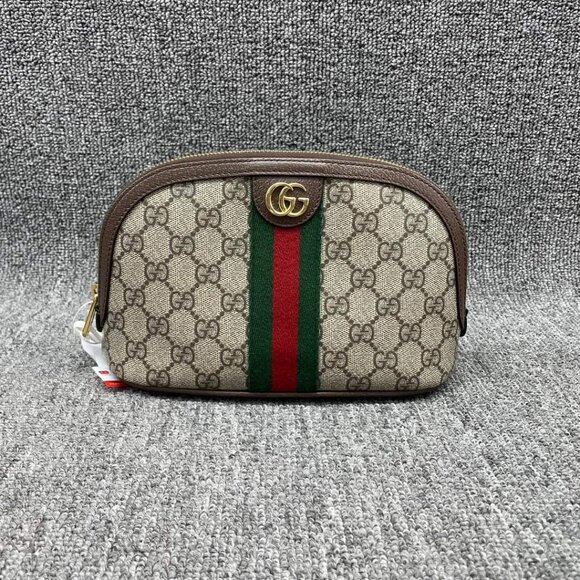 Gucci Handbags - 100% Authentic Gucci GG Supreme Pouch